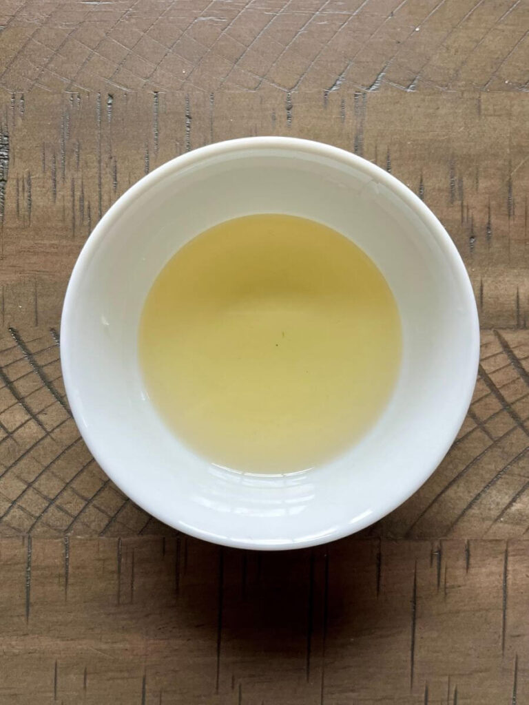 Coconut oil, shea butter and beeswax melted in a bowl